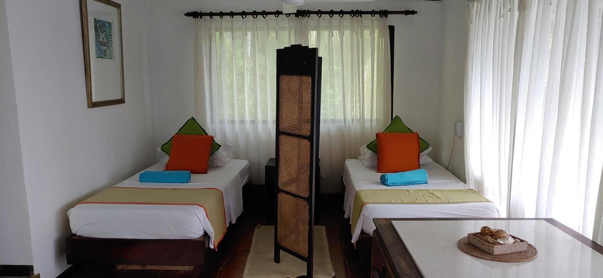 Mango Lodge Anse Volbert Village الغرفة الصورة